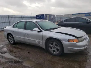 2002 Pontiac Bonneville SLE z VIN 1G2HY54KX24131828, wystawiony jako Copart lot #80754914 z przebiegiem 154 989 mil mil oraz Czysty tytuł • Clean title. Historia ofert i sprzedaży dostępna na DreamBid. Obrazek 4.