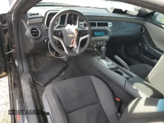 2013 Chevrolet Camaro LS z VIN 2G1FA1E33D9142184, wystawiony jako Copart lot #50584675 z przebiegiem 173 638 mil mil oraz Czysty tytuł • Clean title. Historia ofert i sprzedaży dostępna na DreamBid. Obrazek 8.