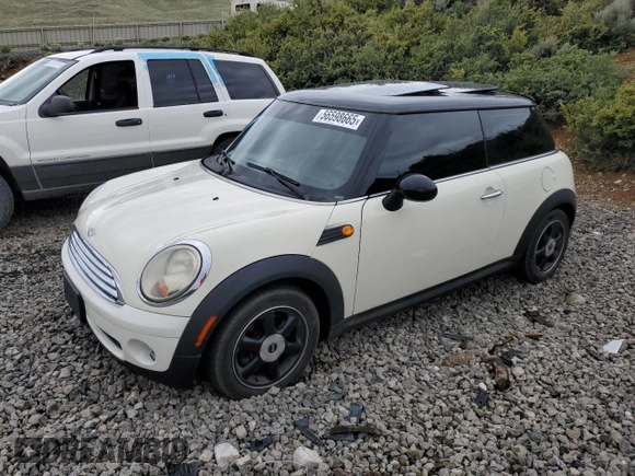 2007 MINI Hardtop with VIN WMWMF33567TT56922, listed as a Copart auction lot 56598665 with 66,605 mi miles and Salvage title. Bid and sale history available at DreamBid. Image 1.