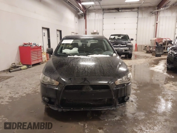 2015 Mitsubishi Lancer SE with VIN JA32V2FW6FU019508, listed as a IAAI auction lot 41633196 with 91,758 mi miles. Bid and sale history available at carsss.com. Image 12.