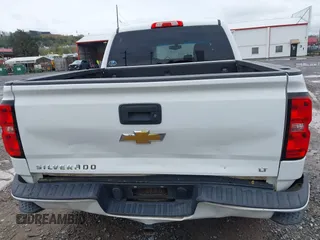 2016 Chevrolet Silverado 1500 LT with VIN 3GCUKREC0GG136136, listed as a IAAI auction lot 41971199 with 179,045 mi miles and . Bid and sale history available at DreamBid. Image 16.