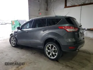 2016 Ford Escape Titanium with VIN 1FMCU9JX9GUB94754, listed as a Copart auction lot 52679435 with 176,075 mi miles and Salvage Title. Bid and sale history available at DreamBid. Image 2.