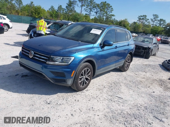 2019 Volkswagen Tiguan SE with VIN 3VV3B7AX2KM006055, listed as a IAAI auction lot 42023713 with 83,570 mi miles and . Bid and sale history available at DreamBid. Image 18.