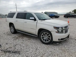 2015 Chevrolet Suburban LTZ with VIN 1GNSCKKC2FR177759, listed as a Copart auction lot 50919105 with 87,793 mi miles and Salvage Title. Bid and sale history available at DreamBid. Image 4.