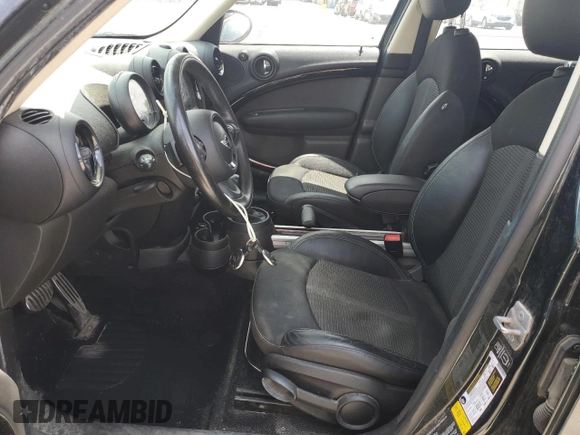 2013 MINI Countryman S with VIN WMWZC3C58DWP21965, listed as a Copart auction lot 61161735 with 142,797 mi miles and Salvage title. Bid and sale history available at DreamBid. Image 7.