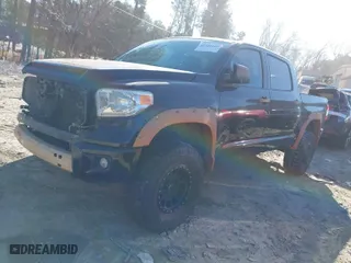 2014 Toyota Tundra 4WD Truck Platinum with VIN 5TFAW5F10EX400395, listed as a IAAI auction lot 41231404 with 152,445 mi miles. Bid and sale history available at carsss.com. Image 2.