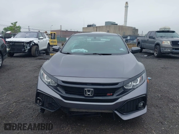 2017 Honda Civic Si with VIN 2HGFC3A50HH752223, listed as a IAAI auction lot 42273886 with 76,454 mi miles and . Bid and sale history available at DreamBid. Image 12.