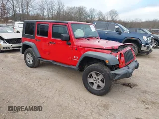 2009 Jeep Wrangler Unlimited X with VIN 1J4GA39169L712057, listed as a IAAI auction lot 41732442 with 158,769 mi miles. Bid and sale history available at carsss.com. Image 1.