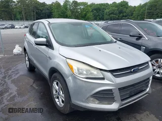 2013 Ford Escape SE with VIN 1FMCU9GX7DUB16959, listed as a IAAI auction lot 42545130 with 161,586 mi miles and . Bid and sale history available at DreamBid. Image 1.