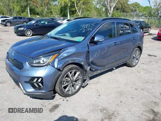 2021 Kia Niro Touring with VIN KNDCC3LC3M5483455, listed as a IAAI auction lot 41678795 with 132,216 mi miles. Bid and sale history available at carsss.com. Image 17.