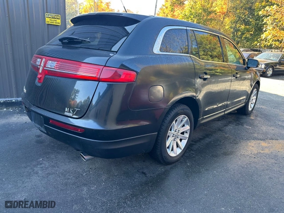 2015 Lincoln MKT with VIN 2LMHJ5NK0FBL03293, listed as a Copart auction lot 42715595 with 115,725 mi miles and Clean Title. Bid and sale history available at carsss.com. Image 4.