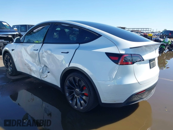 2024 Tesla Model Y Performance with VIN 7SAYGDEF4RF053711, listed as a IAAI auction lot 41836931 with 12,442 mi miles and . Bid and sale history available at DreamBid. Image 3.
