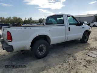 2002 Ford Super Duty F-250 XL with VIN 1FTNF20L22ED69572, listed as a Copart auction lot 80442804 with 218,461 mi miles and Salvage Title. Bid and sale history available at carsss.com. Image 3.