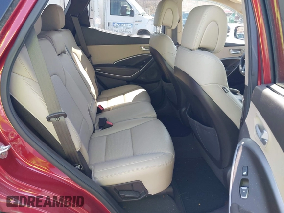 2014 Hyundai Santa Fe z VIN 5XYZUDLB3EG226857, wystawiony jako IAAI lot #41917762 z przebiegiem 42 677 mil mil oraz . Historia ofert i sprzedaży dostępna na DreamBid. Obrazek 8.