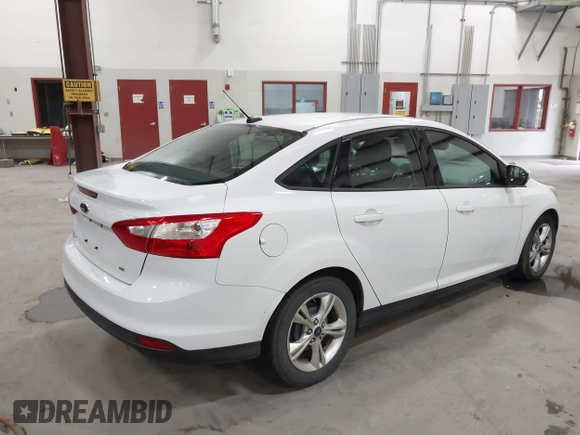 2013 Ford Focus SE with VIN 1FADP3F21DL341649, listed as a IAAI auction lot 42465450 with 180,219 mi miles and . Bid and sale history available at DreamBid. Image 4.