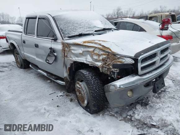 2004 Dodge Dakota SLT with VIN 1D7HG48N34S665027, listed as a IAAI auction lot 41395509 with 128,064 mi miles. Bid and sale history available at carsss.com. Image 1.