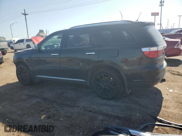 2013 Dodge Durango Crew with VIN 1C4RDJDG5DC701016, listed as a Copart auction lot 60832385 with 236,719 mi miles and Salvage title. Bid and sale history available at DreamBid. Image 2.