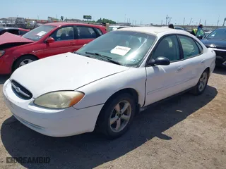 2000 Ford Taurus SES with VIN 1FAFP55U0YA264104, listed as a IAAI auction lot 42006518 with 245,838 mi miles. Bid and sale history available at carsss.com. Image 2.