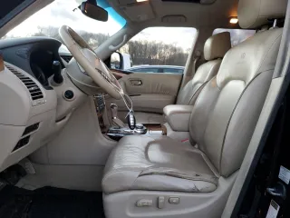 2012 Infiniti QX56 7-passenger with VIN JN8AZ2NE1C9015556, listed as a Copart auction lot 81671054 with 158,247 mi miles and Salvage Title. Bid and sale history available at carsss.com. Image 7.