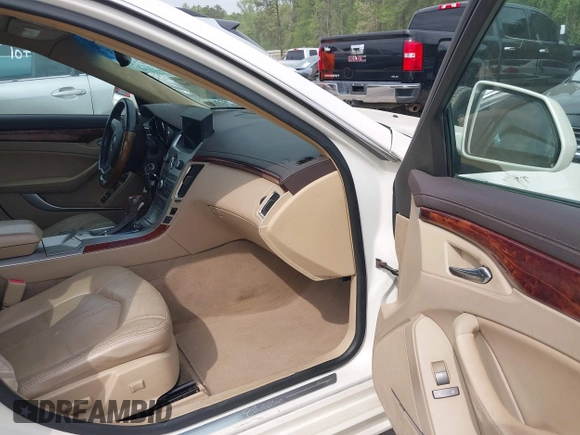 2012 Cadillac CTS Luxury with VIN 1G6DF5E55C0127450, listed as a IAAI auction lot 42020764 with 150,597 mi miles and . Bid and sale history available at DreamBid. Image 5.