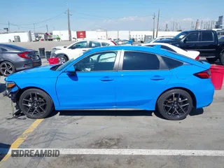 2024 Honda Civic Sport Touring z VIN 19XFL1G85RE026665, wystawiony jako IAAI lot #41735645 z przebiegiem 5025 mil mil oraz . Historia ofert i sprzedaży dostępna na DreamBid. Obrazek 14.
