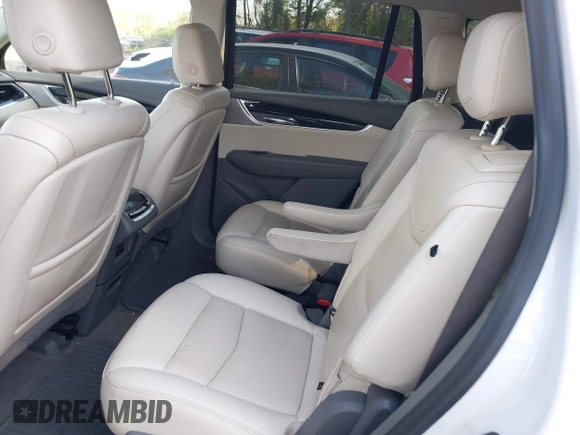 2022 Cadillac XT6 Premium Luxury z VIN 1GYKPDRS3NZ124924, wystawiony jako IAAI lot #42215418 z przebiegiem 32 368 mil mil oraz . Historia ofert i sprzedaży dostępna na DreamBid. Obrazek 8.