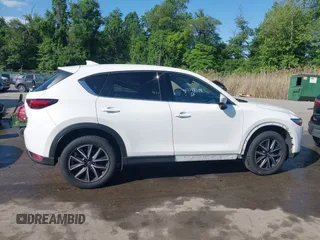2018 Mazda CX-5 Grand Touring z VIN JM3KFBDM8J0420422, wystawiony jako IAAI lot #42188348 z przebiegiem 102 216 mil mil oraz . Historia ofert i sprzedaży dostępna na DreamBid. Obrazek 14.