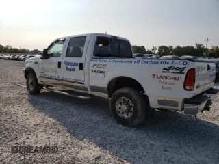 2000 Ford Super Duty F-250 XL with VIN 1FTNW21F2YEE31635, listed as a Copart auction lot 69854734 with 442,635 mi miles and Salvage Title. Bid and sale history available at carsss.com. Image 2.