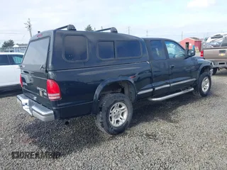 2004 Dodge Dakota SLT with VIN 1D7HG42N94S618531, listed as a IAAI auction lot 41741467 with 202,422 mi miles. Bid and sale history available at carsss.com. Image 4.