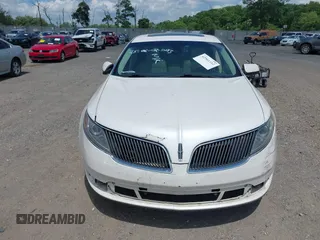 2013 Lincoln MKS EcoBoost with VIN 1LNHL9FT0DG606567, listed as a IAAI auction lot 42561162 with 285,830 mi miles and . Bid and sale history available at DreamBid. Image 12.