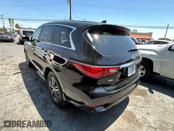 2019 Infiniti QX60 Pure with VIN 5N1DL0MM2KC553817, listed as a Copart auction lot 63514895 with 167,811 mi miles and Clean title. Bid and sale history available at DreamBid. Image 3.