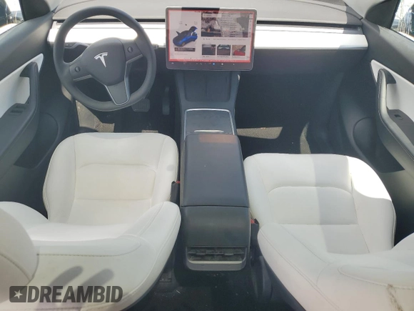 2022 Tesla Model Y Long Range z VIN 7SAYGDEE4NF426893, wystawiony jako Copart lot #55809275 z przebiegiem 16 083 mil mil oraz Szkoda całkowita • Salvage title. Historia ofert i sprzedaży dostępna na DreamBid. Obrazek 8.