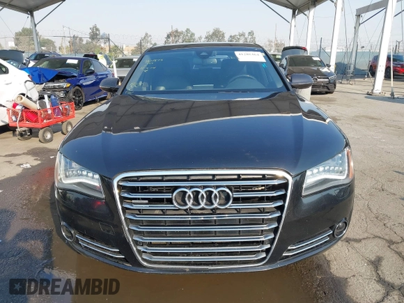 2011 Audi A8 with VIN WAUAVAFD6BN023937, listed as a IAAI auction lot 41288464 with 158,127 mi miles and . Bid and sale history available at DreamBid. Image 12.