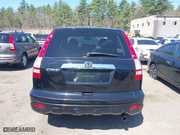 2009 Honda CR-V EX-L with VIN JHLRE48799C012129, listed as a IAAI auction lot 42016110 with 141,819 mi miles. Bid and sale history available at carsss.com. Image 17.
