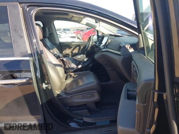 2018 Honda Odyssey EX-L z VIN 5FNRL6H74JB031306, wystawiony jako IAAI lot #41603478 z przebiegiem Nie podano mil oraz . Historia ofert i sprzedaży dostępna na DreamBid. Obrazek 5.