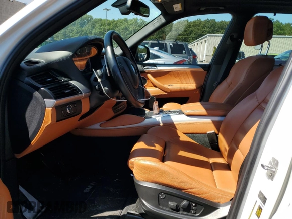 2011 BMW X5 M with VIN 5YMGY0C57BLK26432, listed as a Copart auction lot 67023344 with 74,800 mi miles and Salvage Title. Bid and sale history available at carsss.com. Image 7.