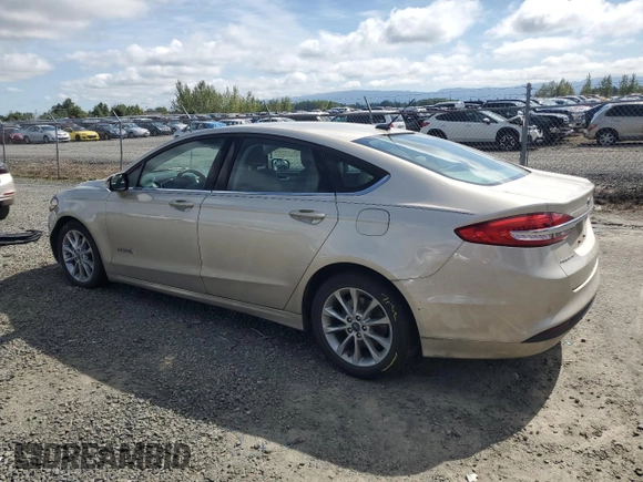 2017 Ford Fusion Hybrid SE with VIN 3FA6P0LU8HR319135, listed as a Copart auction lot 57462035 with 75,288 mi miles and Salvage title. Bid and sale history available at DreamBid. Image 2.