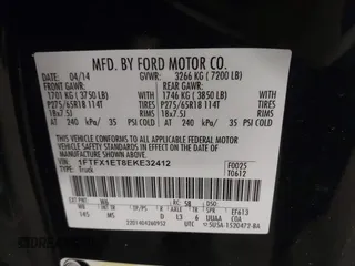 2014 Ford F-150 XL with VIN 1FTFX1ET8EKE32412, listed as a IAAI auction lot 41557331 with 128,744 mi miles. Bid and sale history available at carsss.com. Image 9.