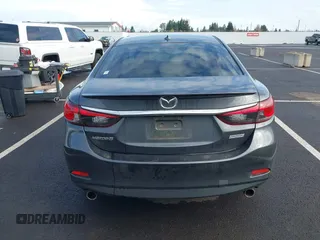 2014 Mazda 6 i Grand Touring with VIN JM1GJ1W63E1147380, listed as a IAAI auction lot 41928637 with 140,091 mi miles and . Bid and sale history available at DreamBid. Image 17.