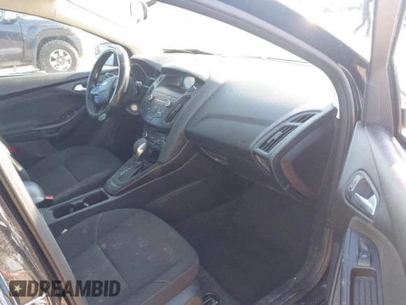 2018 Ford Focus SE with VIN 1FADP3FEXJL286396, listed as a IAAI auction lot 42634912 with 73,769 mi miles and . Bid and sale history available at DreamBid. Image 5.