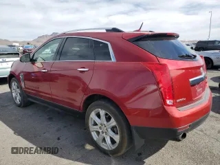 2013 Cadillac SRX Performance Collection with VIN 3GYFNHE34DS517677, listed as a Copart auction lot 50057855 with 126,499 mi miles and Salvage Title. Bid and sale history available at carsss.com. Image 2.
