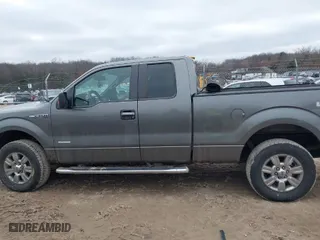 2011 Ford F-150 XL with VIN 1FTFX1ET0BFA92421, listed as a IAAI auction lot 41113779 with 157,292 mi miles. Bid and sale history available at carsss.com. Image 14.