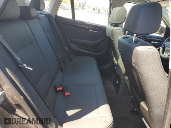 2013 BMW X1 xDrive28i z VIN WBAVL1C5XDVR89392, wystawiony jako Copart lot #55699185 z przebiegiem 127 856 mil mil oraz Czysty tytuł • Clean title. Historia ofert i sprzedaży dostępna na DreamBid. Obrazek 11.