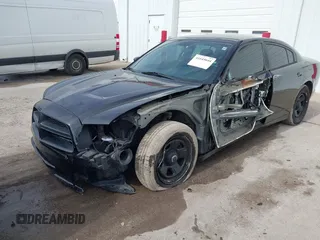 2013 Dodge Charger Police z VIN 2C3CDXAG5DH716369, wystawiony jako IAAI lot #41645644 z przebiegiem 127 535 mil mil oraz . Historia ofert i sprzedaży dostępna na DreamBid. Obrazek 17.