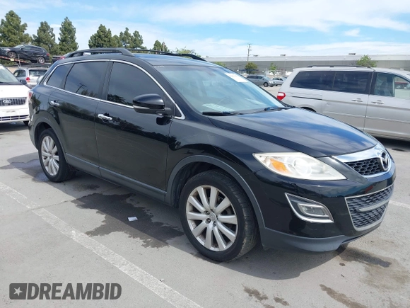 2010 Mazda CX-9 Grand Touring with VIN JM3TB2MV7A0211357, listed as a IAAI auction lot 42013067 with 161,081 mi miles and . Bid and sale history available at DreamBid. Image 1.