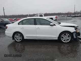 2017 Volkswagen Jetta SEL with VIN 3VWL17AJ4HM214456, listed as a IAAI auction lot 41692381 with 78,951 mi miles and . Bid and sale history available at DreamBid. Image 14.