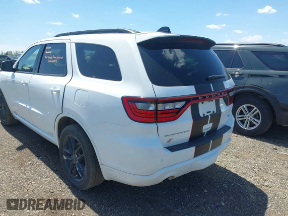 2023 Dodge Durango R/T Plus with VIN 1C4SDJCTXPC553725, listed as a IAAI auction lot 42290693 with 74,995 mi miles and . Bid and sale history available at DreamBid. Image 3.