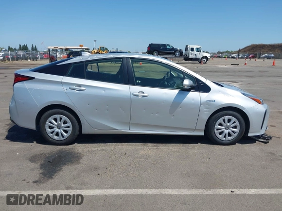 2020 Toyota Prius L Eco with VIN JTDKARFU0L3109212, listed as a IAAI auction lot 42356801 with 81,478 mi miles and . Bid and sale history available at DreamBid. Image 13.