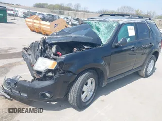 2012 Ford Escape XLT z VIN 1FMCU9DG0CKA83804, wystawiony jako IAAI lot #42099423 z przebiegiem Nie podano mil oraz . Historia ofert i sprzedaży dostępna na DreamBid. Obrazek 17.