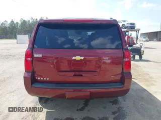 2019 Chevrolet Tahoe LT z VIN 1GNSCBKC9KR102552, wystawiony jako IAAI lot #41792517 z przebiegiem 92 856 mil mil oraz . Historia ofert i sprzedaży dostępna na DreamBid. Obrazek 16.